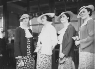 Four wome modelling fashion hats, 1920s