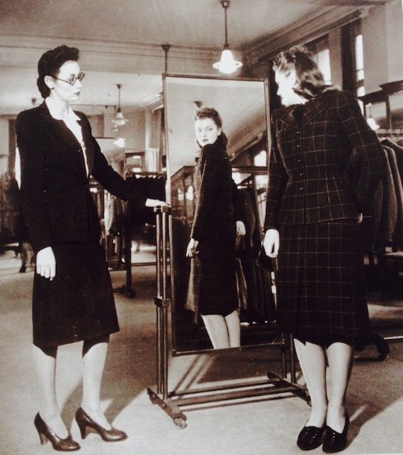 a-model-tries-on-a-utility-suit-date-unknown-photo-by-james-jarche a-model-tries-on-a-utility-suit-date-unknown-photo-by-james-jarche
