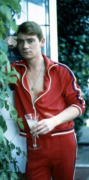 Seven 80s clothing styles - Anthony Andrews wears red tracksuit