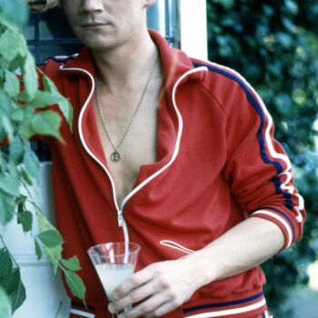 Seven 80s clothing styles - Anthony Andrews wears red tracksuit