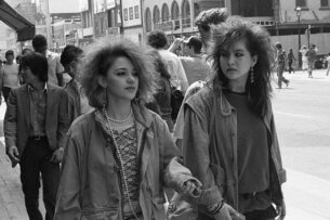 vintage 80s fashion styles - two women in a New Wave style. Photo taken on Yonge Street, Toronto circa 1985