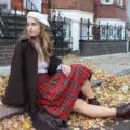 90s fashion trend - 90s white blouse, cape & tartan skirt