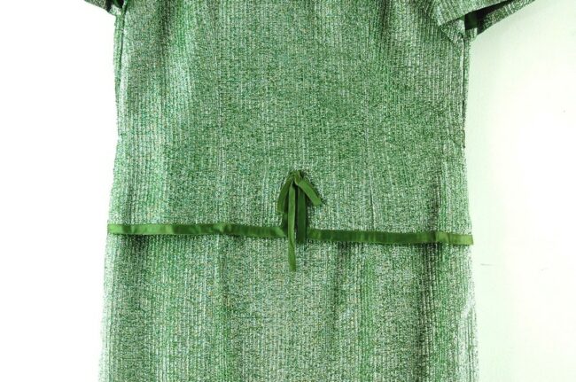 Close up of 1960s Metallic Green Shift Dress