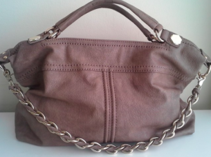 handbag. Image copyright free via Flickr user Smittenkittenorig. high end recycled clothing